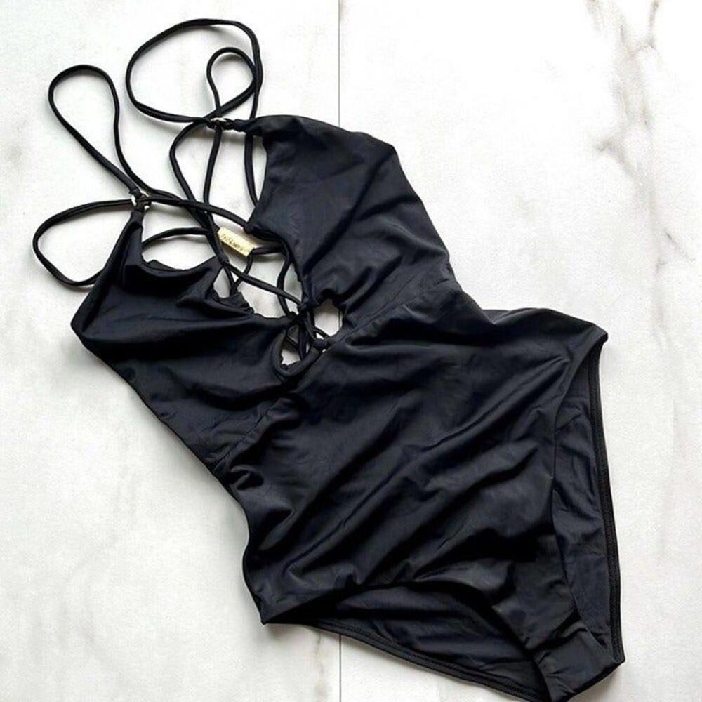 Anthropologie PilyQ black strap metal ring criss cross open back one piece suit